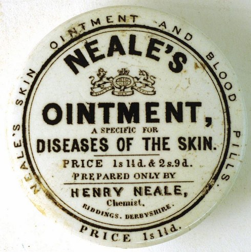 A NEALE'S OINTMENT POT LID FROM RIDDINGS, DERBYSHIIRE 